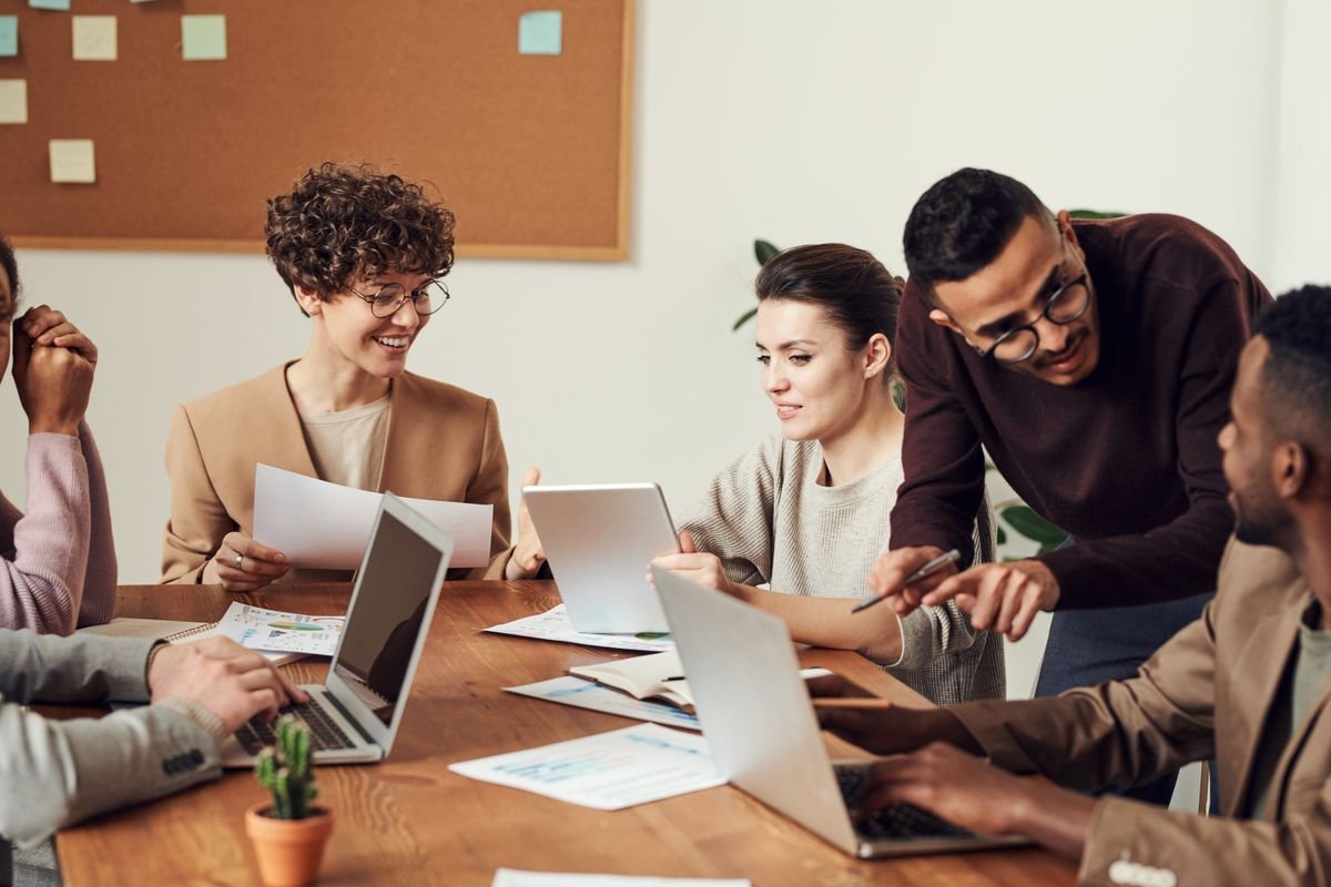 Business owners meeting with a web design agency